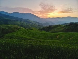 Sonnenaufgang über den Reisfeldern von Longsheng